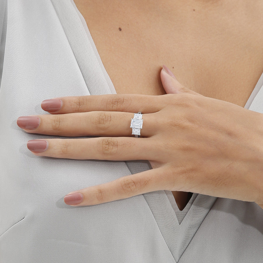 Handmade emerald three-stone ring, perfect for those who appreciate sophistication